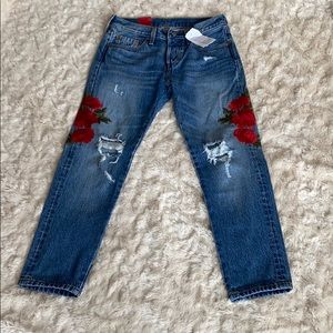 Levi’s tapered 501 distressed jeans